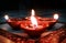 Group of diya in temple with lighting for prayer on Diwali Festival