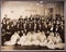 Group of doctors and nurses posing in a big hall, archive photo