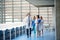 Group of doctors walking in corridor on medical conference.