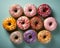 a group of donuts arranged in a circle on a blue background