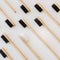 Group of eco bamboo toothbrushes, on white background.