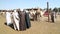 Group of Egyptian men haggling at Daraw camel market