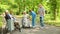 Group of elderly patients with nurse. Assisting seniors