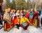 Group of elderly Russian people in colorful traditional festive costume.