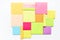 Group of empty coloured post-its as background