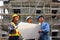 Group of engineers standing in front of the project  inspection  the detail of the building