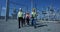 Group of engineers walking on solar station platform