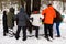 A group of environmentalists standing around the tree