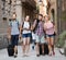 Group of european tourists walking the street