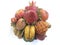 A group of fake fruits on a basket with white background or Various Kind of fruit on a Beautiful Wicker Basket.