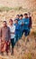 Group of farmers standing around an agricultural field