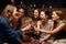 Group Of Female Friends Enjoying Night Out At Rooftop Bar