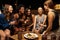 Group Of Female Friends Enjoying Night Out At Rooftop Bar