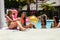 Group of female friends having fun in swimming pool