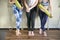 Group of female friends in sportswear together while standing in a gym after yoga workout. Women standing by a wall with