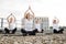 Group of females enhancing health via outside yoga workout