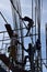 A group of Filipino Construction steel workers assembling steel bars on high-rise building with no proper protective suits and saf