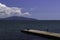 Group of fishermans fishing on stone breakwater.