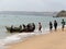 Group of fishermen returning from the sea with their fish ready to be cooked or sold on the local market.