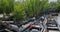 Group of fishing boats anchored on the edge of a muddy Nipa forest