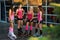 Group of fitness women dressed in sportswear speaks before kangoo jumping workout