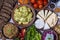 Group food on table: boiled young potatoes, beans, braised cabbage, beet salad with cottage cheese, sliced cheeses, tomato, korean