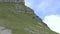 Group of four people climbing mountain