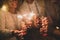 Group of four people having fun and enjoying holding glasses of champagne and sparklers celebrating the happy new year together