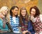 Group Of Four Teenage Girls Taking Picture