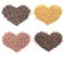 Group of four types of dry organic rice seed in heart shape