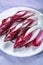 Group of fresh red Radicchio chicory or Belgian endive vegetables, also known as witlof salade