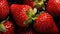Group of Fresh Red Strawberry Fruits with Water Drops As Defocused Background