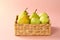 Group of fresh, ripe and juicy apples and pears in a water hyacinth basket against pink background