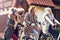 Group of friends on bikes in forest during fall time