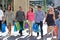 Group Of Friends Carrying Shopping Bags On City Street
