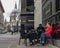 Group of friends chat at a cafe overlooking the iconic St. Paul`s Cathedral in London, England, UK