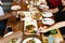 Group of friends hands with fork having fun eating variety food on the table.