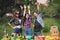 Group of friends having picnic in park.