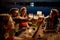 Group of friends having a toast wit the beer in the bar on the lake