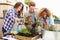 Group Of Friends Planting Rooftop Garden Together