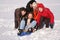 Group of friends on plastic sled