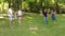 Group of friends playing in game ring toss in Park