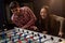 Group of friends playing table soccer at beer pub