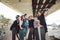 Group of friends skateboarders taking selfie on phone in skate park. large group children with skateboards take memory photo on