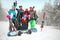 Group of friends skiers and snowboarders having fun on snowbound