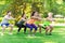 Group of friends or sportsmen exercising outdoors