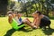 Group of friends or sportsmen exercising outdoors