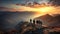 Group of friends or tourists are climbing on top of mountain and admire the view and sunset