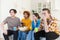 Group of friends watching sport match soccer football game on tv at home. Football fans disappointed missing goal