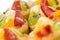 Group of fruit tartlets on white background. Shallow dof